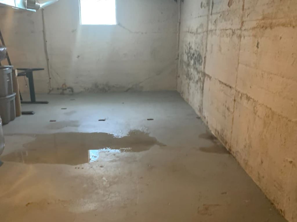 Will waterproof paint stop basement leaks?