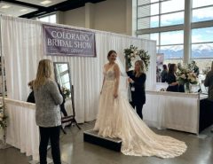 Bride trying on a wedding gown at the Colorado Bridal Show 2026