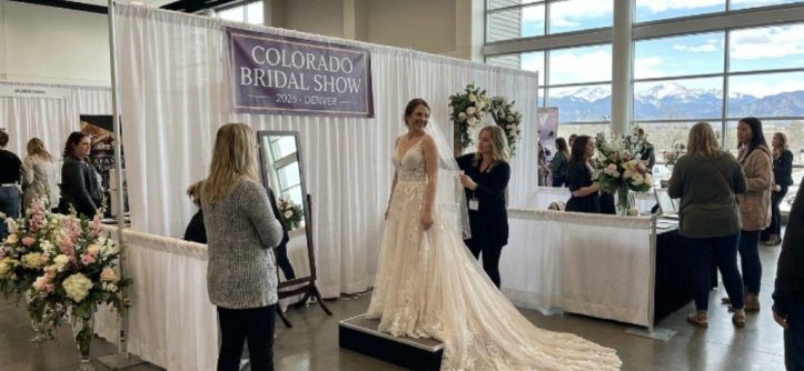 Bride trying on a wedding gown at the Colorado Bridal Show 2026