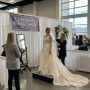Bride trying on a wedding gown at the Colorado Bridal Show 2026