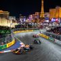 Formula 1 cars racing at night past illuminated Las Vegas Strip hotels along the Las Vegas Strip Circuit during the 2026 Las Vegas Grand Prix on November 21