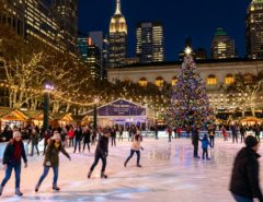 Bryant Park Winter Village 2026 ice skating rink at night with holiday lights
