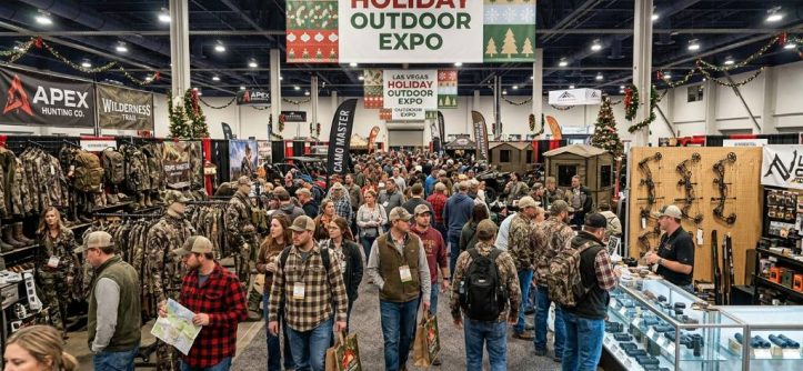 Crowd of shoppers browsing hunting gear booths at the Las Vegas holiday outdoor expo